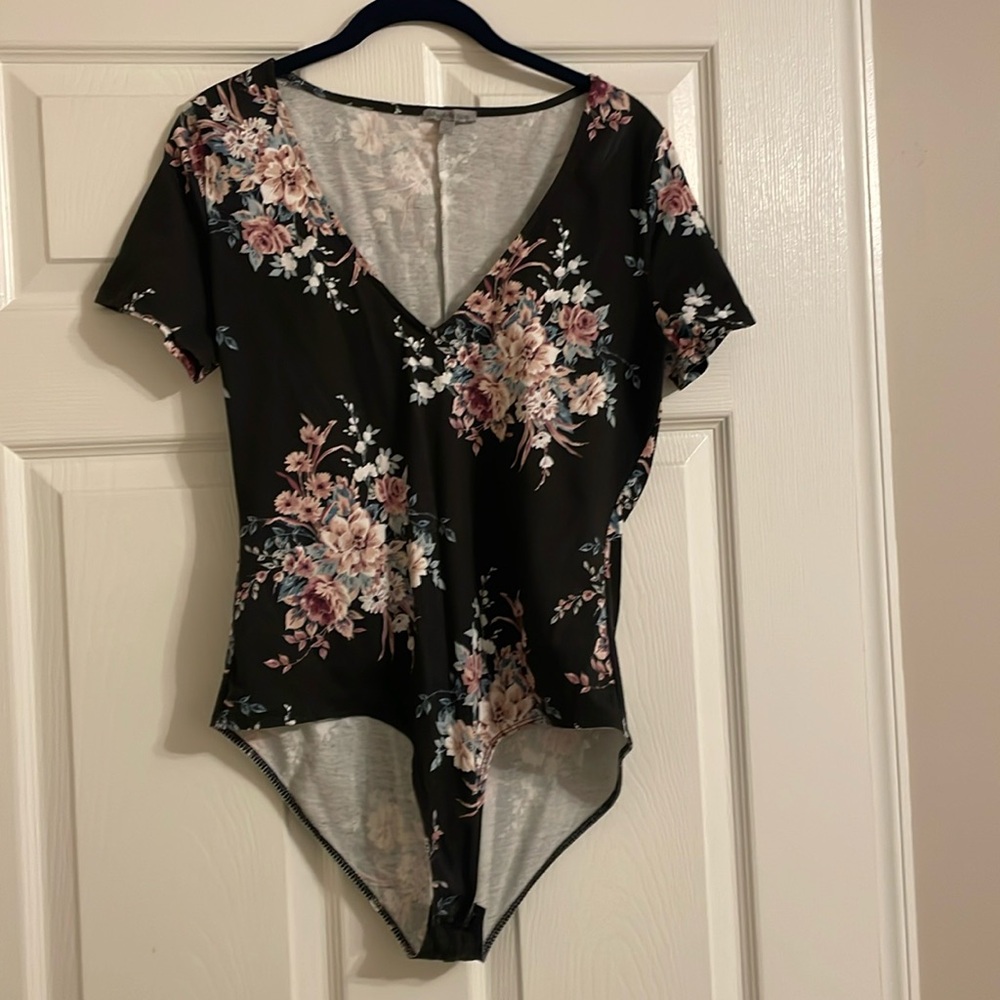 Black T-shirt, bodysuit with floral accents
